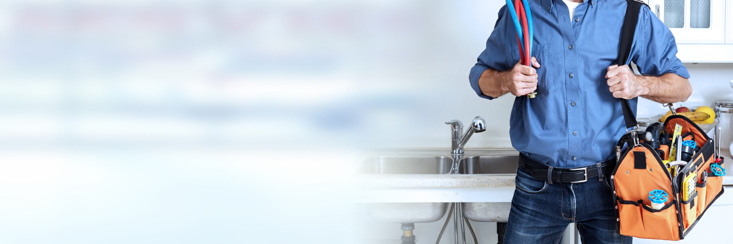 Professional plumber working renovation in kitchen home.